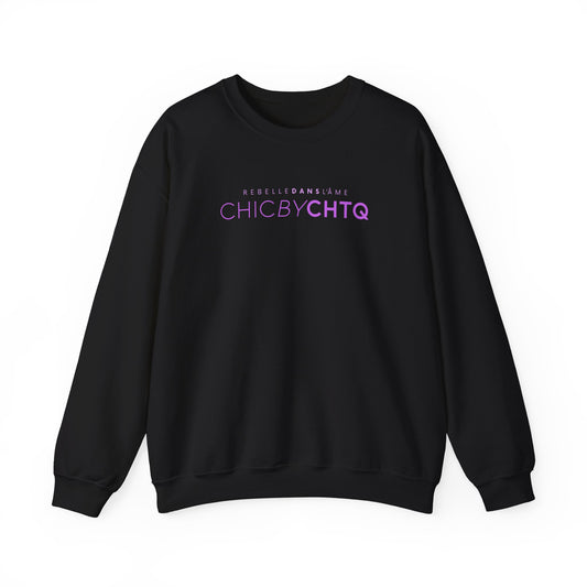 A black crewneck sweatshirt with text reading “CHIC BY CHTQ” and “REBELLE DANS L’ÂME” printed across the chest.