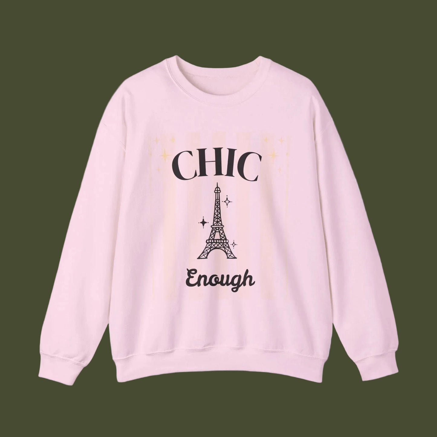Pink sweatshirt with Eiffel Tower graphic and text on a white background