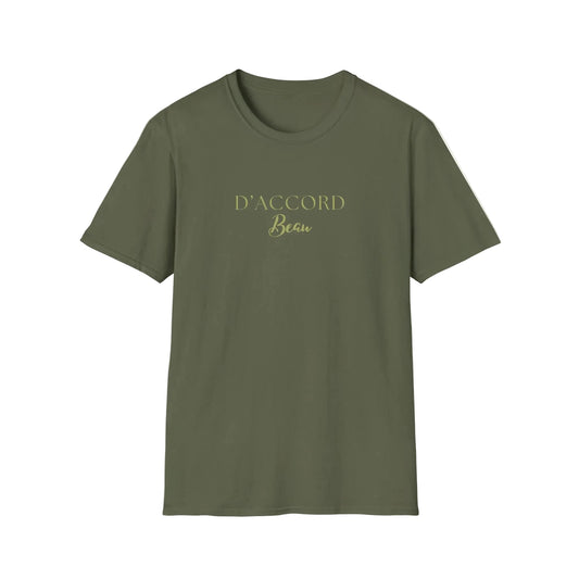 Green D’Accord Beau T-shirt featuring gold typography on the front, displayed against a white background.
