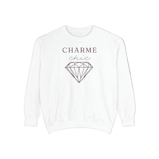 A white crewneck sweatshirt featuring a graphic print on the front with the text 'CHARME chic' and a black line art diamond illustration, displayed against a solid white background.