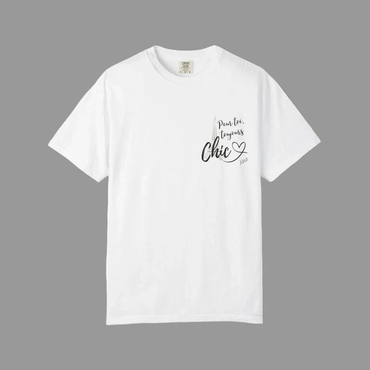 An off-white short-sleeve crewneck t-shirt with a small graphic on the left chest that reads 'pour toi toujours Chic' in black and gray lettering with a small heart below, displayed on a clean white background.