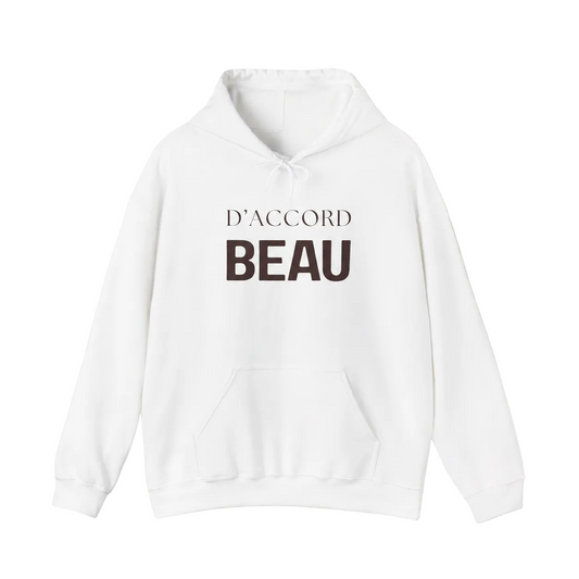 White D’Accord Beau pullover hoodie featuring dark brown typography on the front, displayed against a soft off-white studio background.