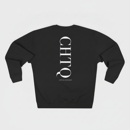 Black crewneck sweatshirt with a large white vertical CHTQ graphic and L’Art du Contraste text on the back, displayed against a white background.