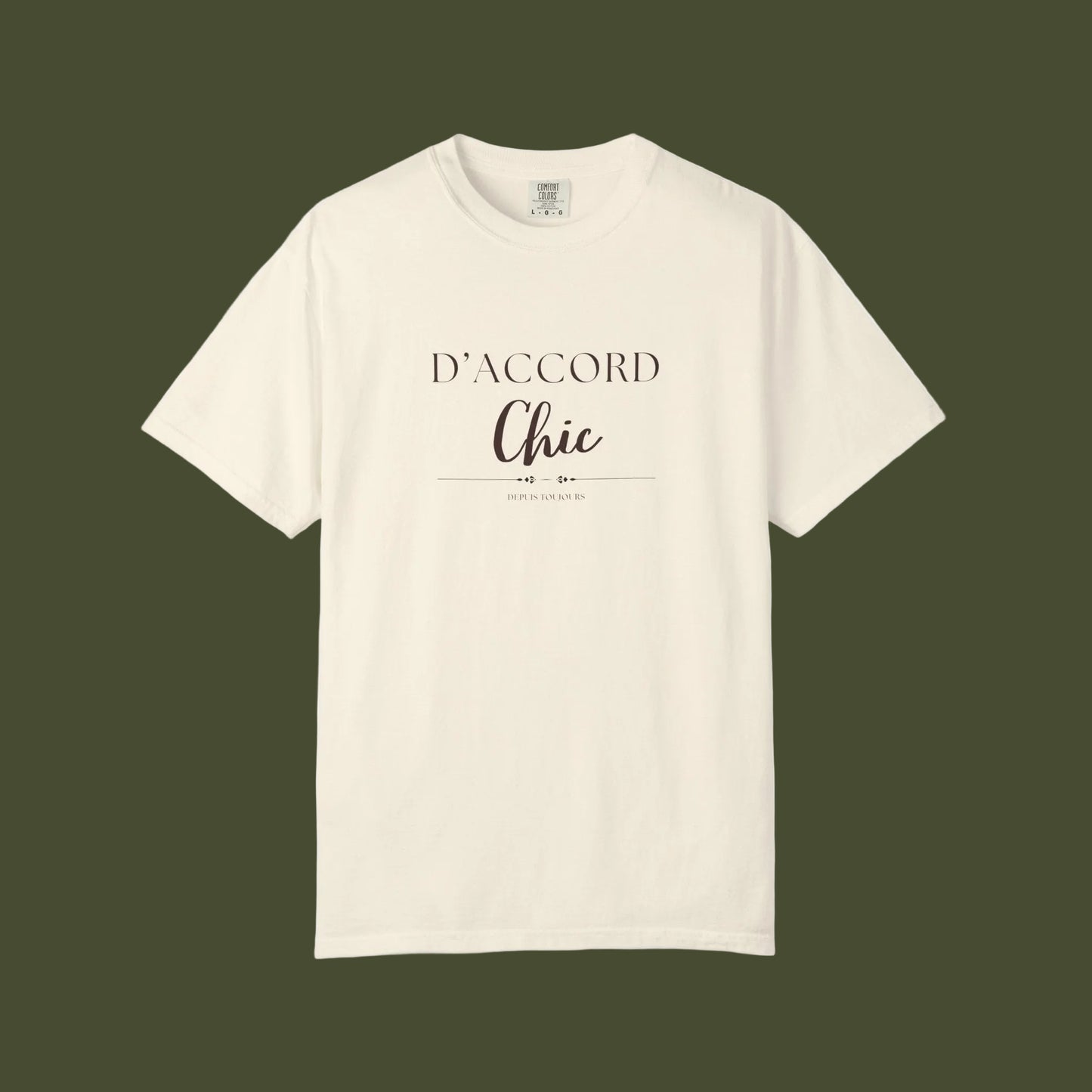 An off-white short-sleeve crewneck t-shirt with 'D'ACCORD Chic' printed in black on the chest, displayed against a solid white background.