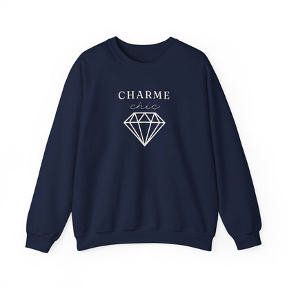 A navy crewneck sweatshirt featuring a light “CHARME chic” graphic with a diamond outline on the front, displayed against a clean white background.
