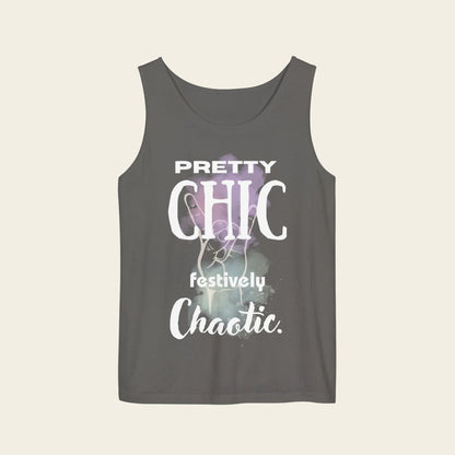 A dark gray sleeveless tank top with a graphic print on the front that reads 'PRETTY CHIC festively Chaotic.' in white text over a purple and white abstract background, shown on a plain white background.