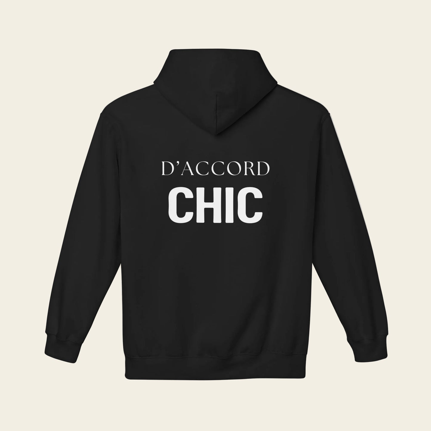 A black pullover hoodie shown from the back, featuring the words 'D'ACCORD CHIC' printed in white across the upper back.