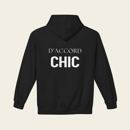 A black pullover hoodie shown from the back, featuring the words 'D'ACCORD CHIC' printed in white across the upper back.