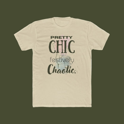 A beige short-sleeve crewneck t-shirt featuring a graphic print on the front with the text 'PRETTY CHIC festively Chaotic.' in black and gray lettering over a faint pastel illustration.