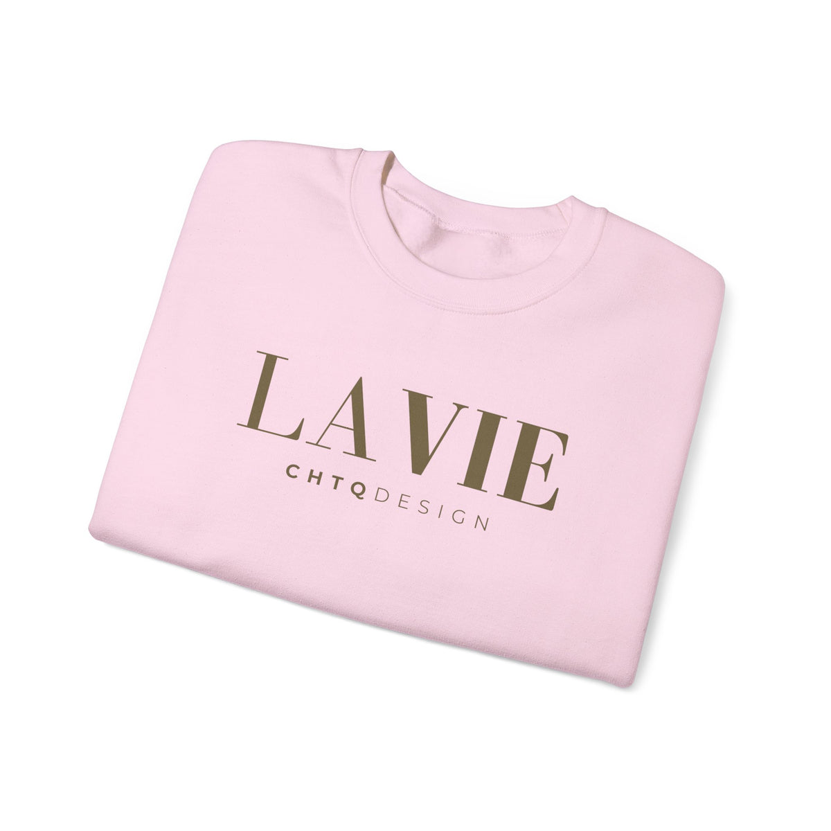 A folded light pink crewneck sweatshirt with 'LA VIE' printed in a dark brown serif font and 'CHTQDESIGN' in a smaller sans-serif font, shown on a clean white background.