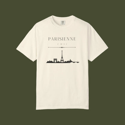 An off-white short-sleeve crewneck t-shirt featuring a black graphic print of the Paris skyline with the text 'PARISIENNE CHIC' above it, displayed on a clean white background.