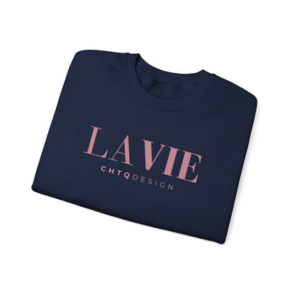 Folded navy blue sweatshirt with 'LAVIE CHTQDESIGN text on a light background