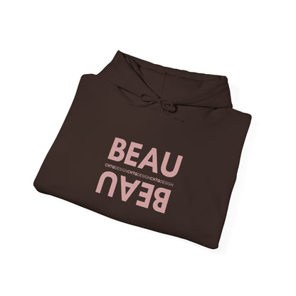 A folded brown BEAU graphic hoodie with a mirrored dusty pink BEAU print and CHTQ Design detail on the chest, displayed against a white background.