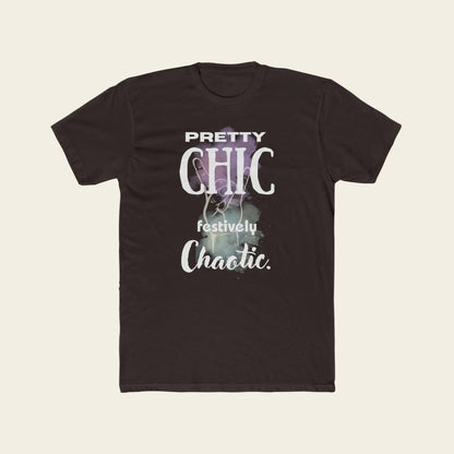 A dark brown short-sleeve crewneck t-shirt with a graphic print on the front. The graphic features the text 'PRETTY CHIC festively Chaotic.