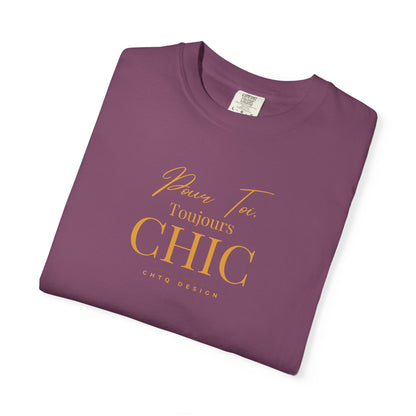 Folded purple CHTQ Design T-shirt with gold “Pour Toi. Toujours CHIC” typography on the front.
