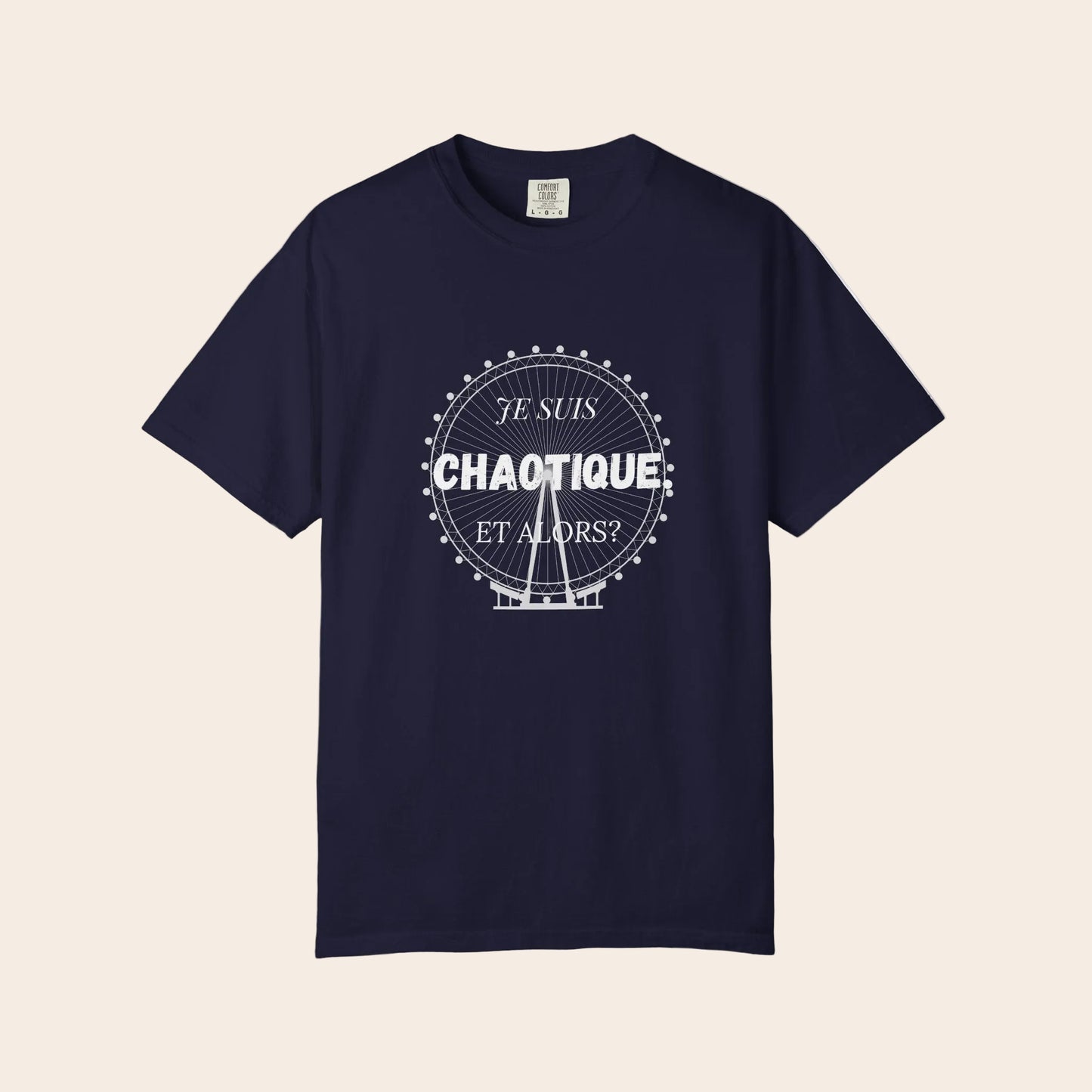 Navy blue t-shirt with colorful 'Je Suis Chaotique Et Alors?' text design on a white background