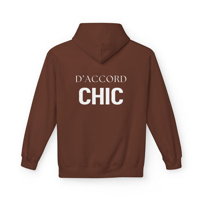 A brown pullover hoodie shown from the back, featuring the words 'D'ACCORD CHIC' printed in white across the upper back.