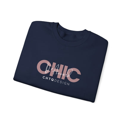 A folded CHIC D’Accord CHTQ Design navy crewneck sweatshirt with dusty rose graphic