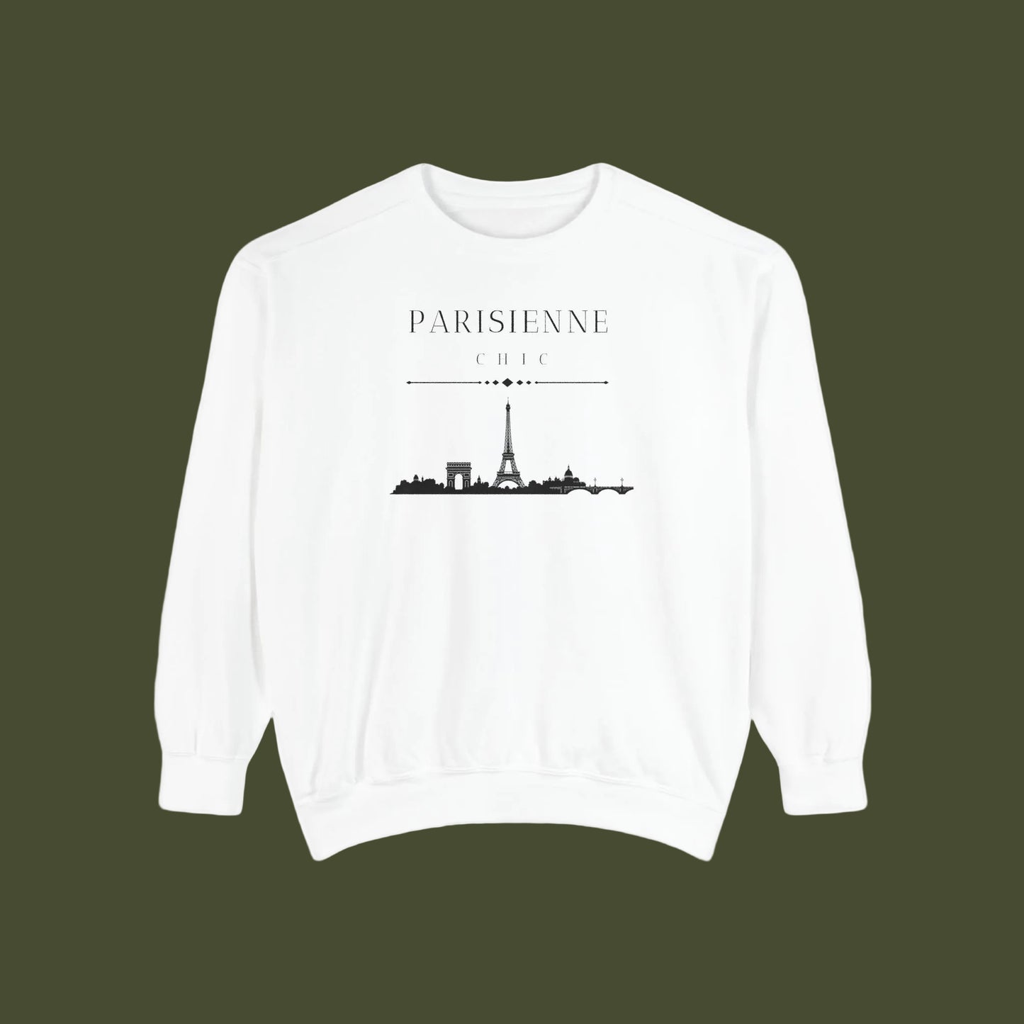 A white crewneck sweatshirt featuring a black graphic print of the Paris skyline with the text 'PARISIENNE CHIC' above it, displayed on a clean white background.