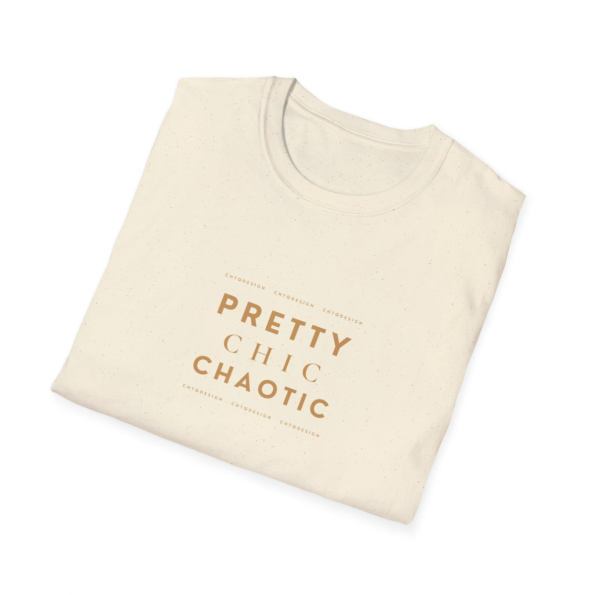 A folded cream-colored cotton t-shirt with a warm brown text graphic reading 'PRETTY CHIC CHAOTIC' on the front, displayed on a clean white background.