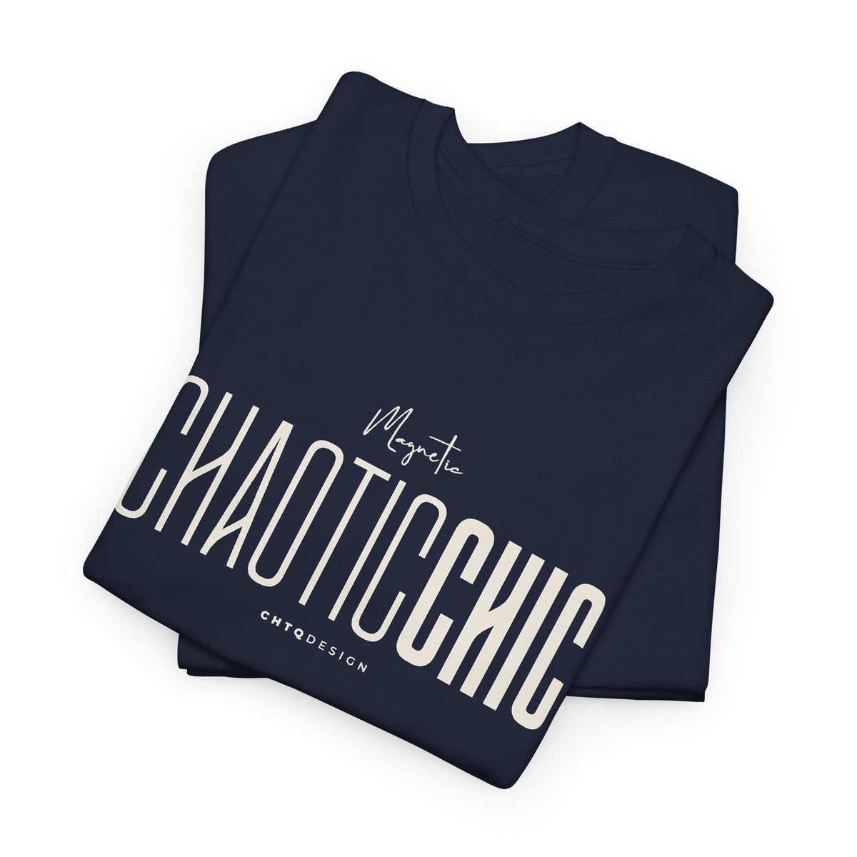 Folded Navy blue Magnetic CHAOTICCHIC graphic T-shirt featuring cream-colored typography, handwritten Magnetic detail and CHTQ Design lettering on a white background.