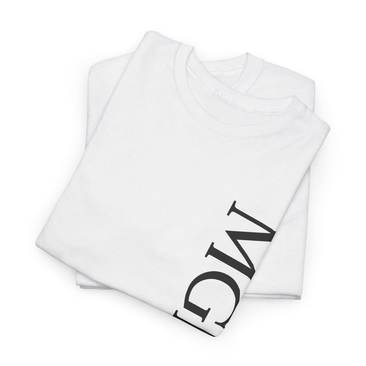 A folded white crewneck t-shirt with a large black graphic print of the letters 'MGNFQ' on the sleeve, displayed on a clean white background.