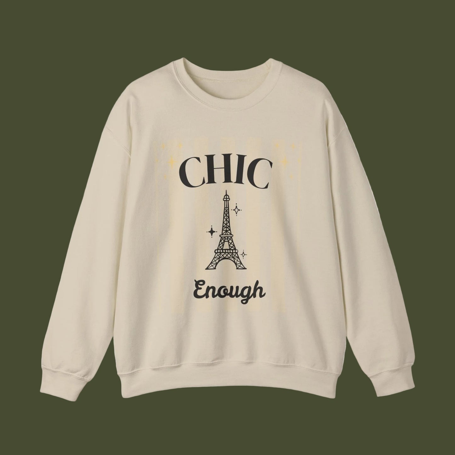 Beige sweatshirt with Eiffel Tower graphic and text on a white background