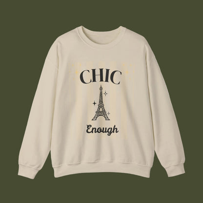 Beige sweatshirt with Eiffel Tower graphic and text on a white background