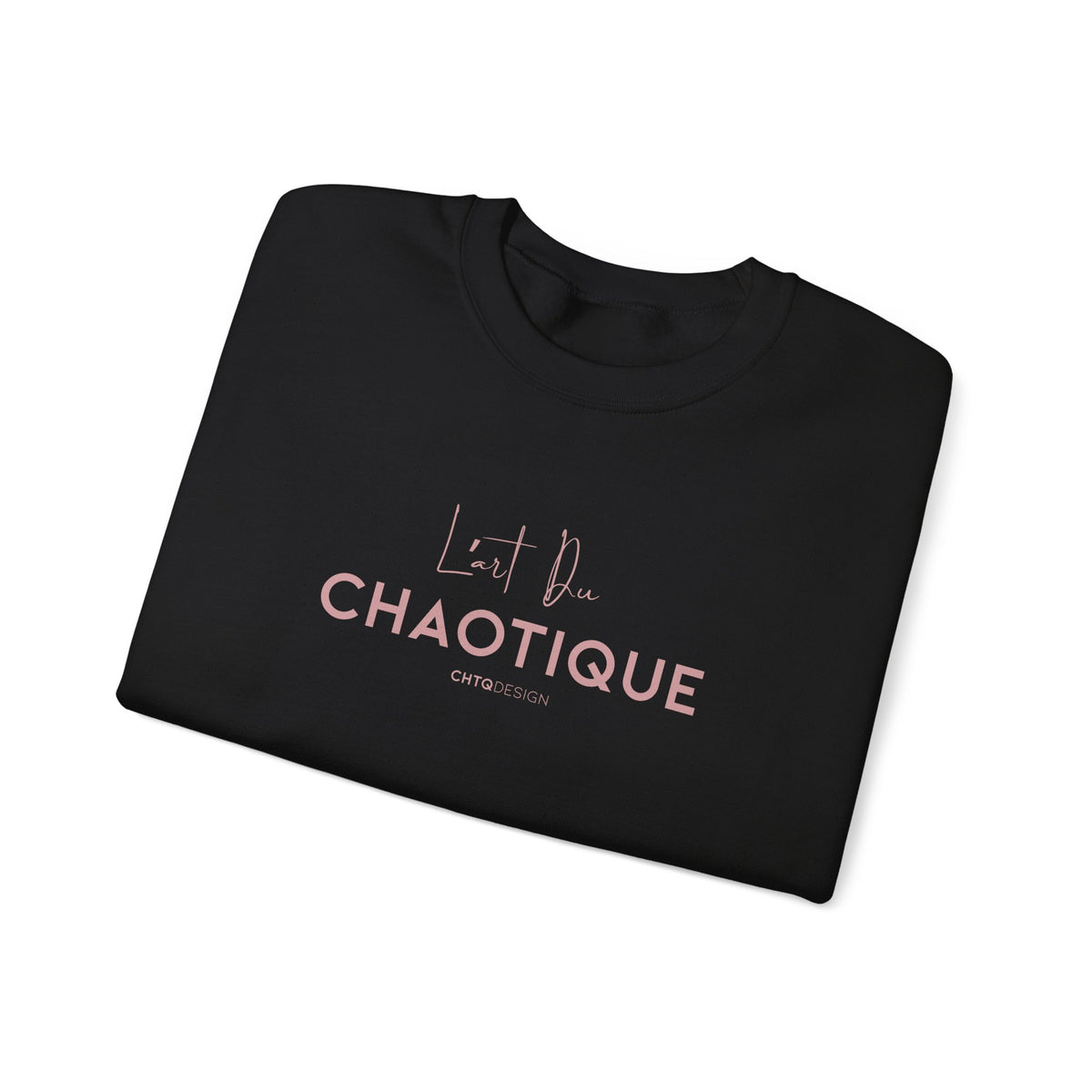 Folded black L’ART DU CHAOTIQUE crewneck sweatshirt from back, with minimalist front rose gold typography in front, displayed against a clean white background.