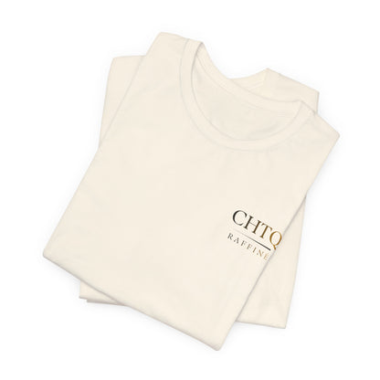 A folded light crewneck t-shirt with a small text CHTQ Raffine on the left chest, displayed on a clean white background.