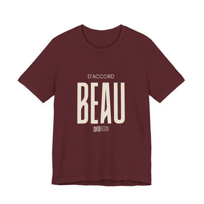 D’ACCORD BEAU Graphic T-Shirt by CHTQ Design in maroon featuring bold cream BEAU lettering, D’ACCORD text and a small CHTQ Design signature.