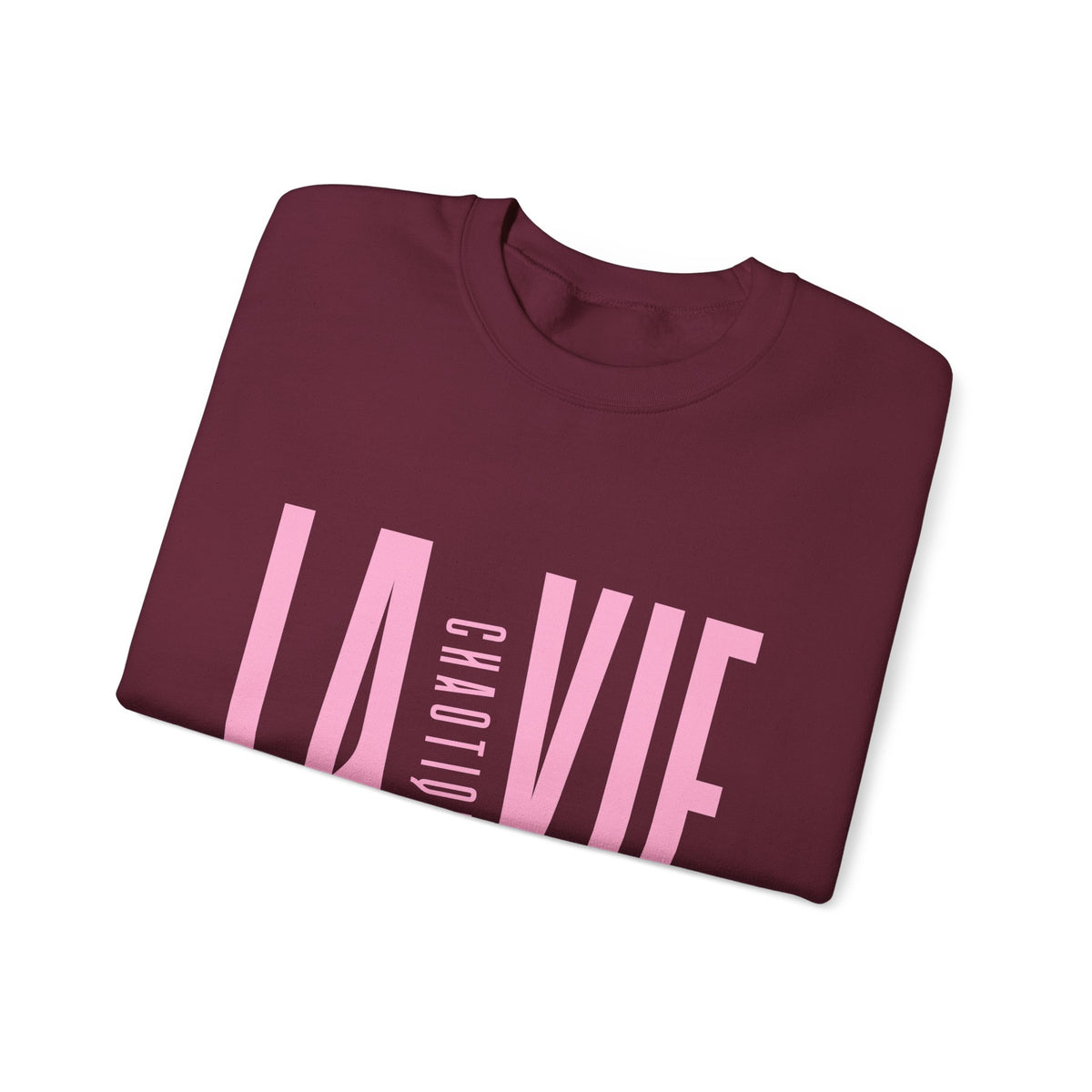 Folded maroon LA VIE CHAOTIQUE sweatshirt featuring light pink typography