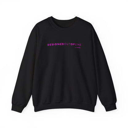 An black crewneck sweatshirt featuring pink “DESIGNED OUT OF LINE” text across the chest, displayed against a clean white background.