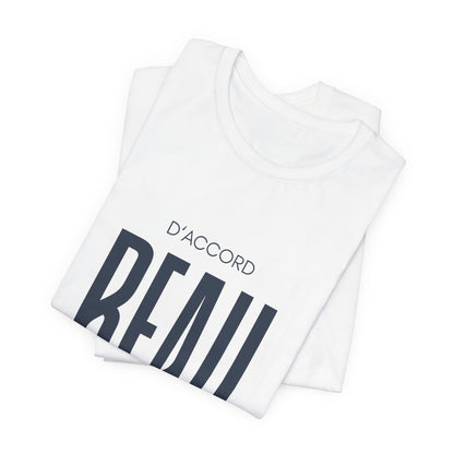 Folded D’ACCORD BEAU Graphic T-Shirt by CHTQ Design in white featuring oversized dark navy BEAU lettering, D’ACCORD text and CHTQ Design signature.