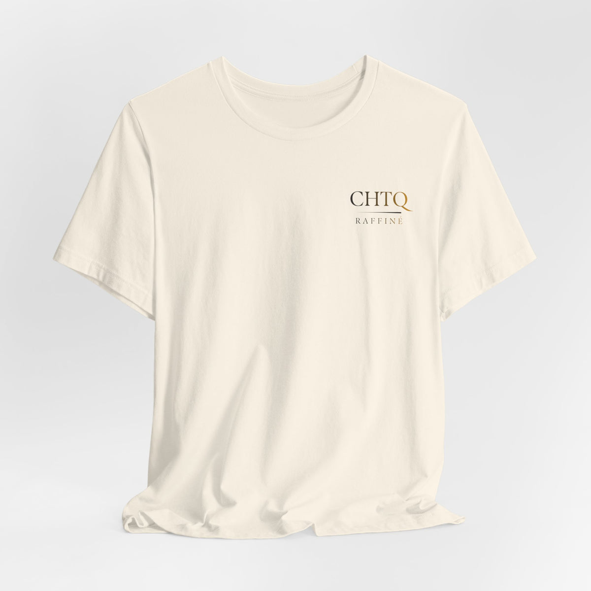 Light t-shirt with text 'CHTQ Raffine' on a light gray background