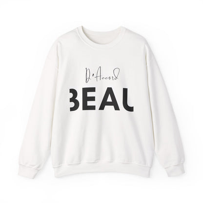 White BEAU D’ACCORD graphic crewneck sweatshirt with black handwritten and bold lettering on the front.