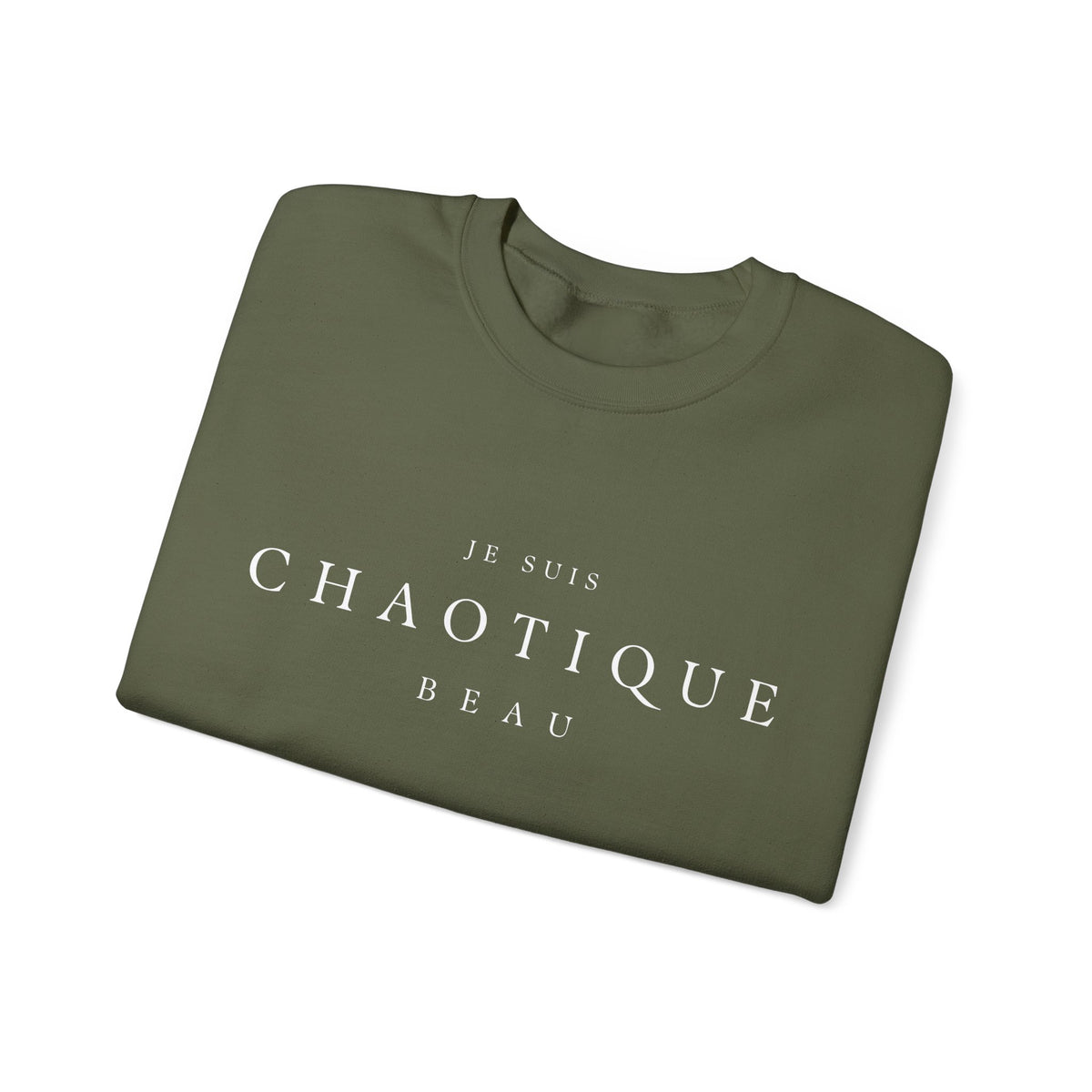 Folded  green crewneck sweatshirt with the text 'JE SUIS CHAOTIQUE BEAU' printed in white across the chest