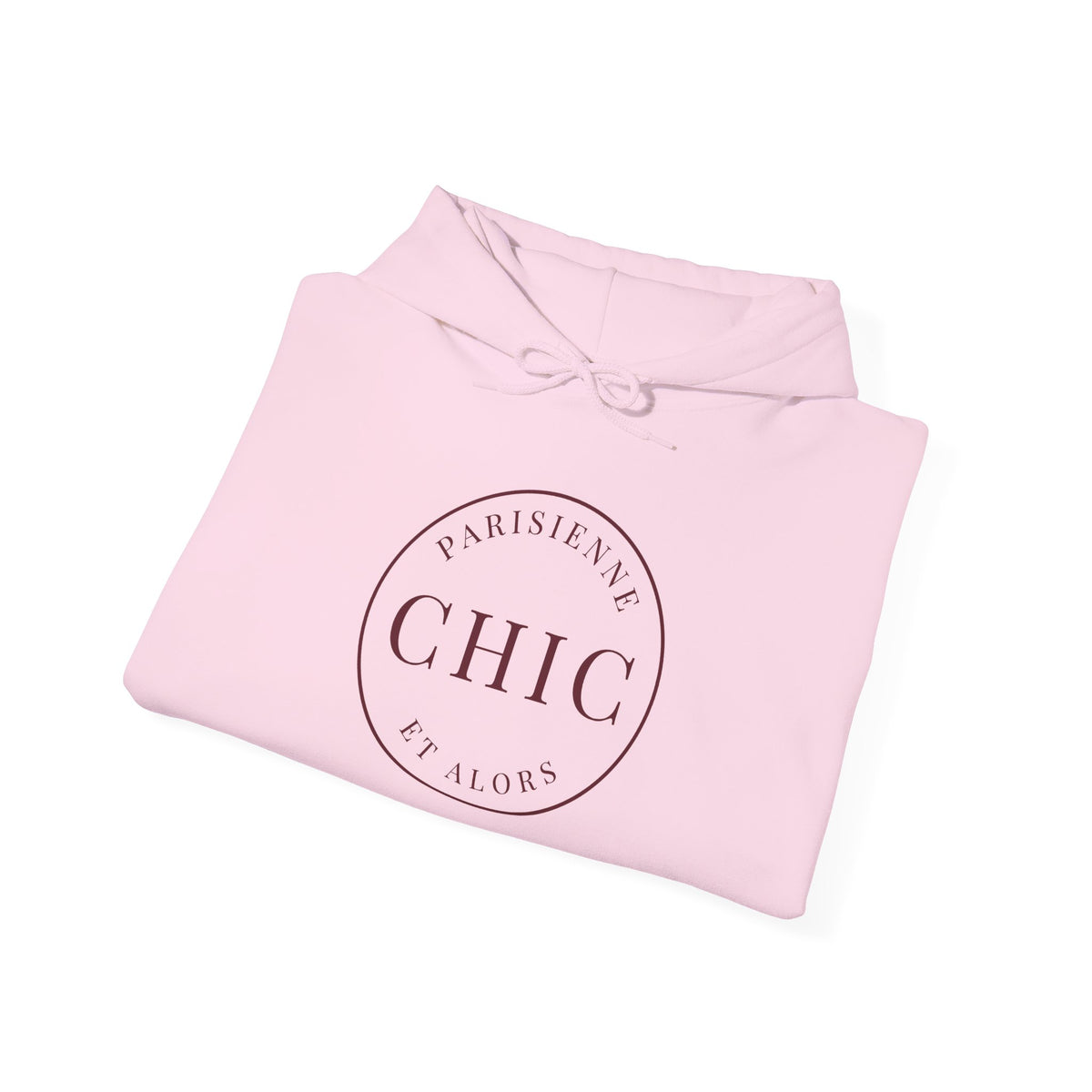 A folded light pink hoodie with a circular dark brown graphic on the front reading 'PARISIENNE CHIC ET ALORS', shown on a clean white background.
