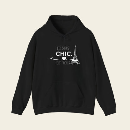 Black hoodie with 'Je Suis Chic. Et Toi?' logo on a white background