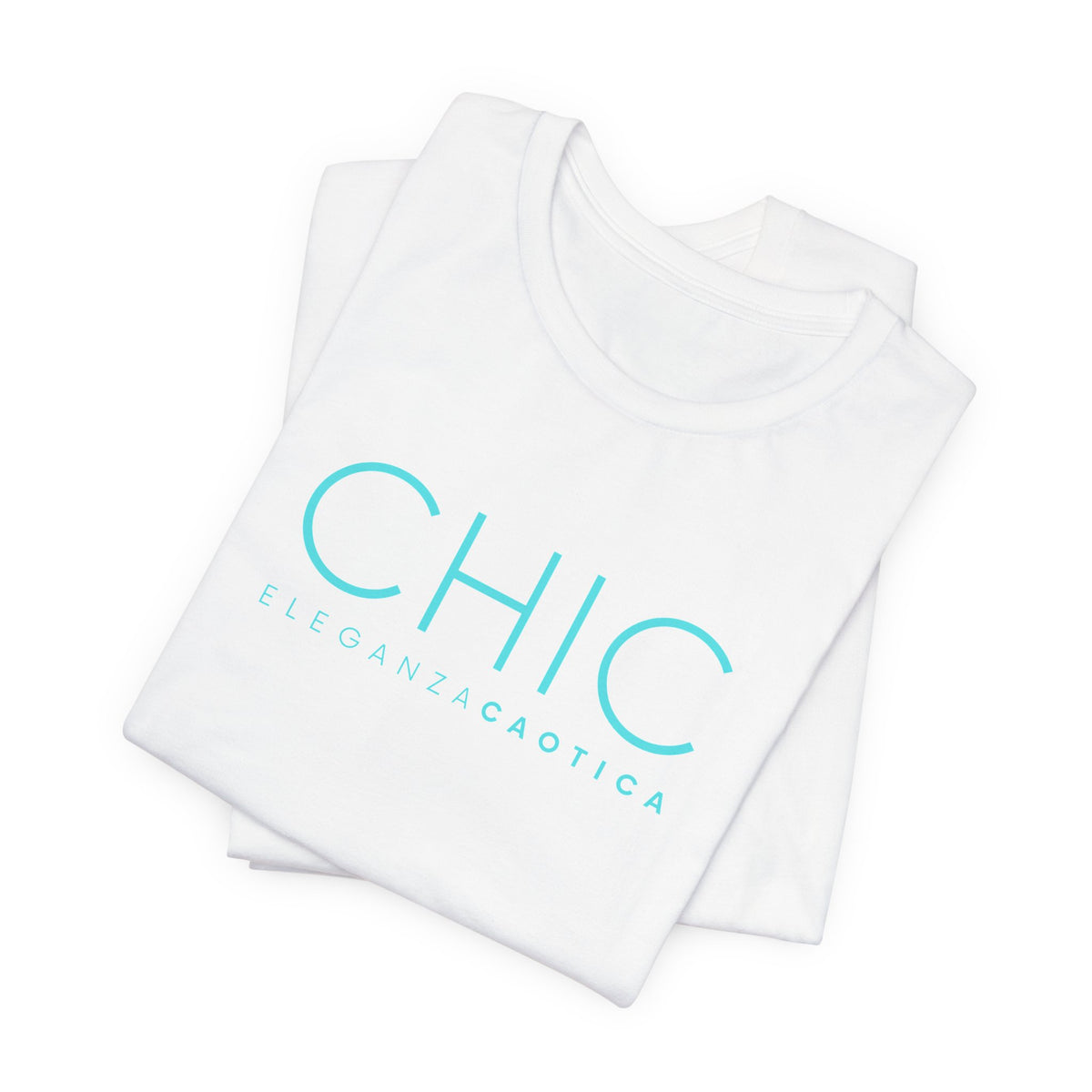 A white short-sleeve crewneck T-shirt with 'CHIC' printed in light blue sans-serif typography and 'ELEGANZA CAOTICA' in smaller text underneath, shown against a light gray gradient studio background.