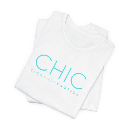 A white short-sleeve crewneck T-shirt with 'CHIC' printed in light blue sans-serif typography and 'ELEGANZA CAOTICA' in smaller text underneath, shown against a light gray gradient studio background.