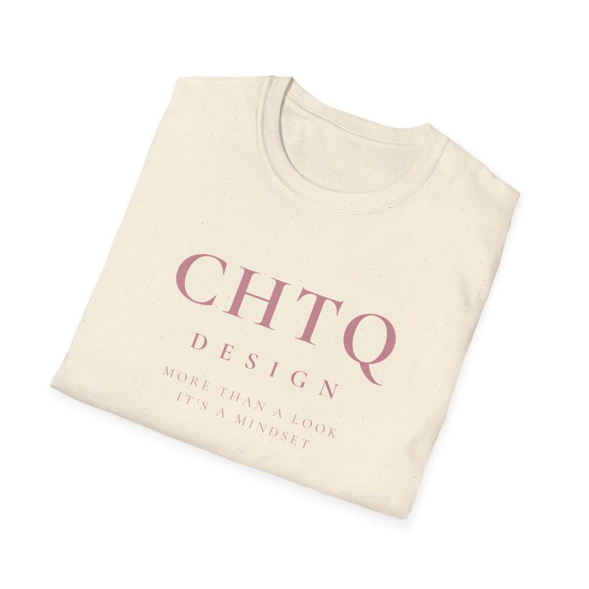 A folded cream-colored t-shirt with dusty pink text reading 'CHTQ DESIGN' and 'MORE THAN A LOOK IT'S A MINDSET' on a clean white background.