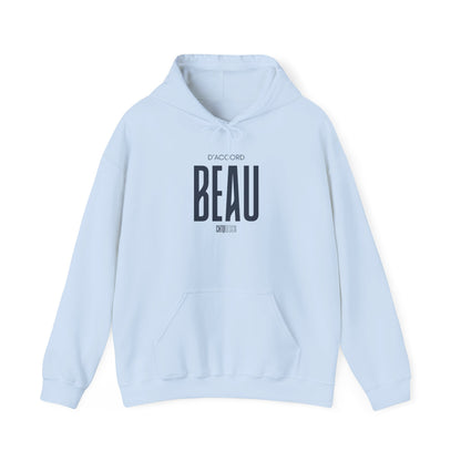 A light blue pullover hoodie with a front kangaroo pocket and a dark navy graphic print on the chest reading 'D'ACCORD BEAU' with smaller text below, displayed on a clean white background.