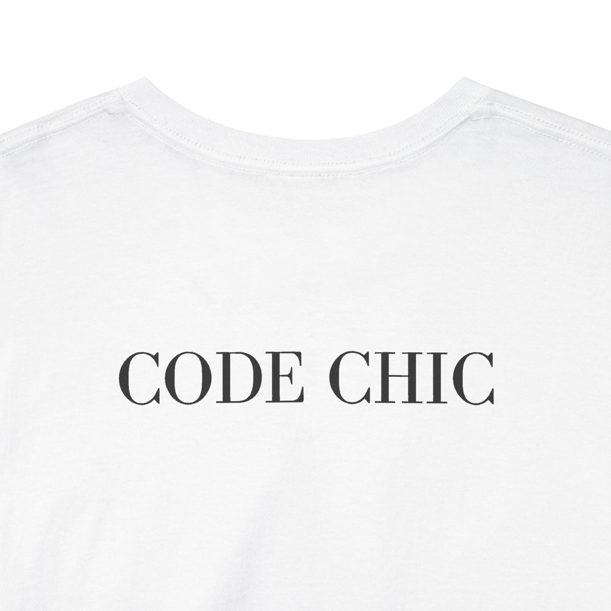 Close-up of a white crewneck t-shirt with the words 'CODE CHIC' printed in black serif capital letters across the chest.