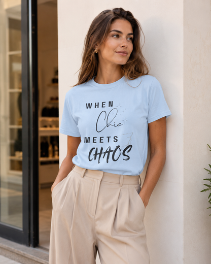 Woman wearing light blue 'When Chic Meets Chaos' t-shirt