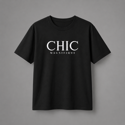 Black CHIC MAGNIFIQUE graphic T-shirt featuring minimalist white French-inspired typography on the chest, displayed against a clean light gray studio background.