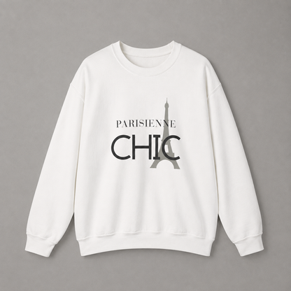 White crewneck sweatshirt featuring a black “PARISIENNE CHIC” graphic with a stylized Eiffel Tower, displayed against a neutral gray studio background.