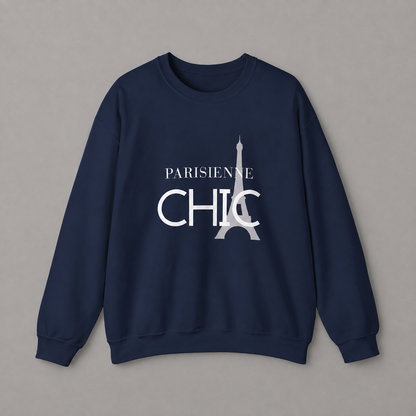 Navy blue crewneck sweatshirt featuring a white “PARISIENNE CHIC” graphic with a stylized Eiffel Tower, displayed against a neutral gray studio background.