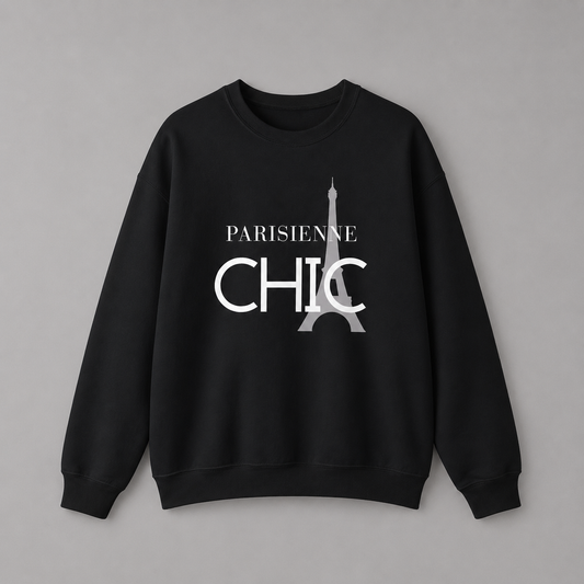 Black crewneck sweatshirt featuring a white “PARISIENNE CHIC” graphic with a stylized Eiffel Tower, displayed against a neutral gray studio background.