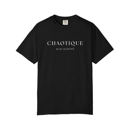 A black short-sleeve crewneck t-shirt with 'CHAOTIQUE MAIS RAFFINE' printed in white serif text across the chest, displayed flat against a neutral gray background.